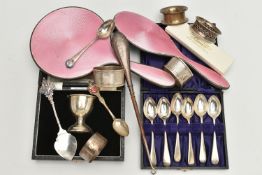 AN ASSORTMENT OF SILVER ITEMS, to include a cased egg cup, a cased set of six teaspoons, four