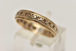 AN 18CT GOLD FULL ETERNITY RING, yellow and white band, set with colourless spinels, hallmarked 18ct