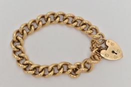 A HEAVY 9CT GOLD BRACELET, solid curb links, hallmarked 9ct Sheffield, fitted with a large heart