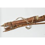 A VERY INTERESTING LONG BOW, ARROWS AND QUIVER OF NATIVE ORIGINS, the quiver is made from a hollowed