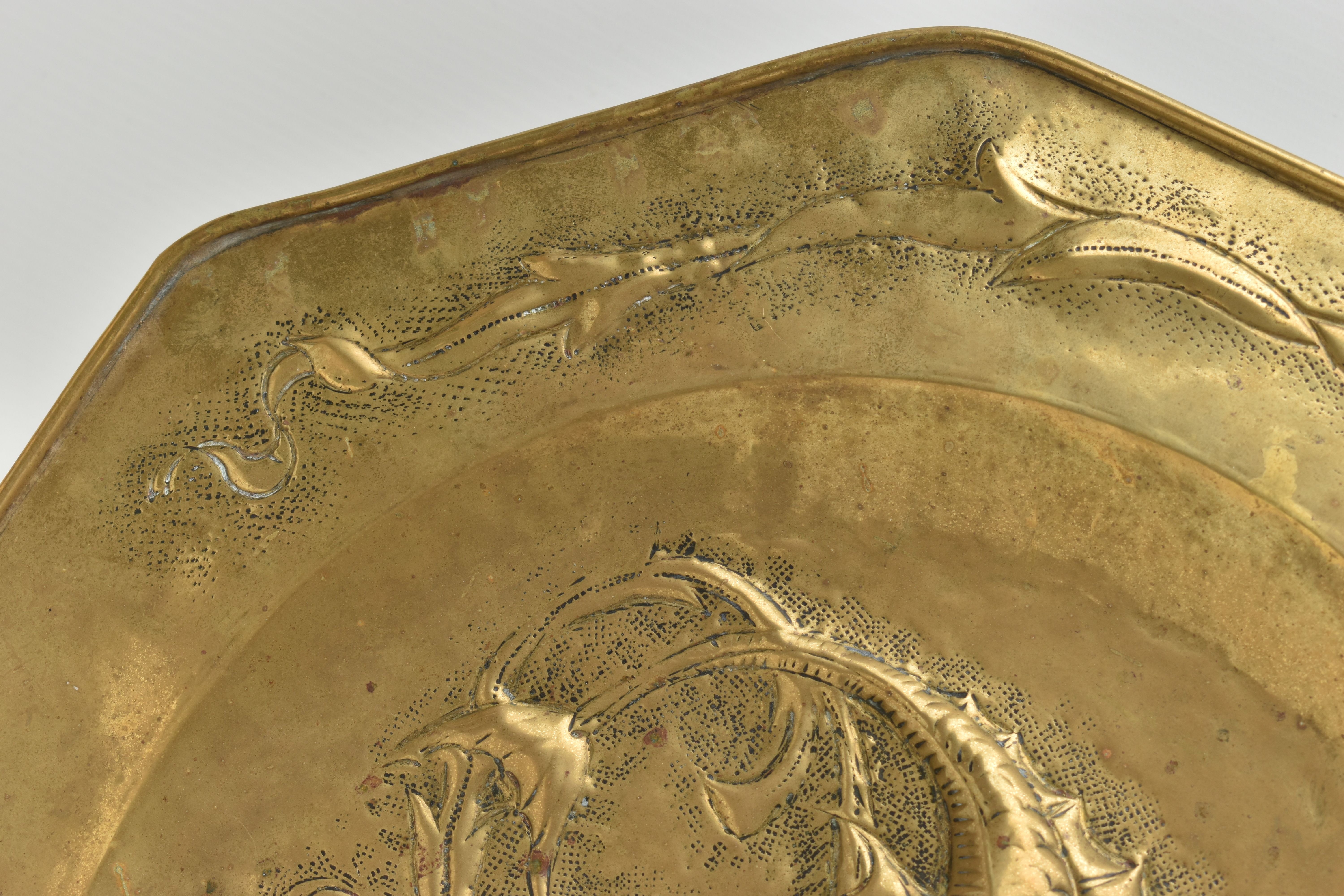 MANNER OF JOHN PEARSON, AN OCTAGONAL ARTS & CRAFTS BRASS CHARGER, embossed with two fish to the - Image 3 of 7