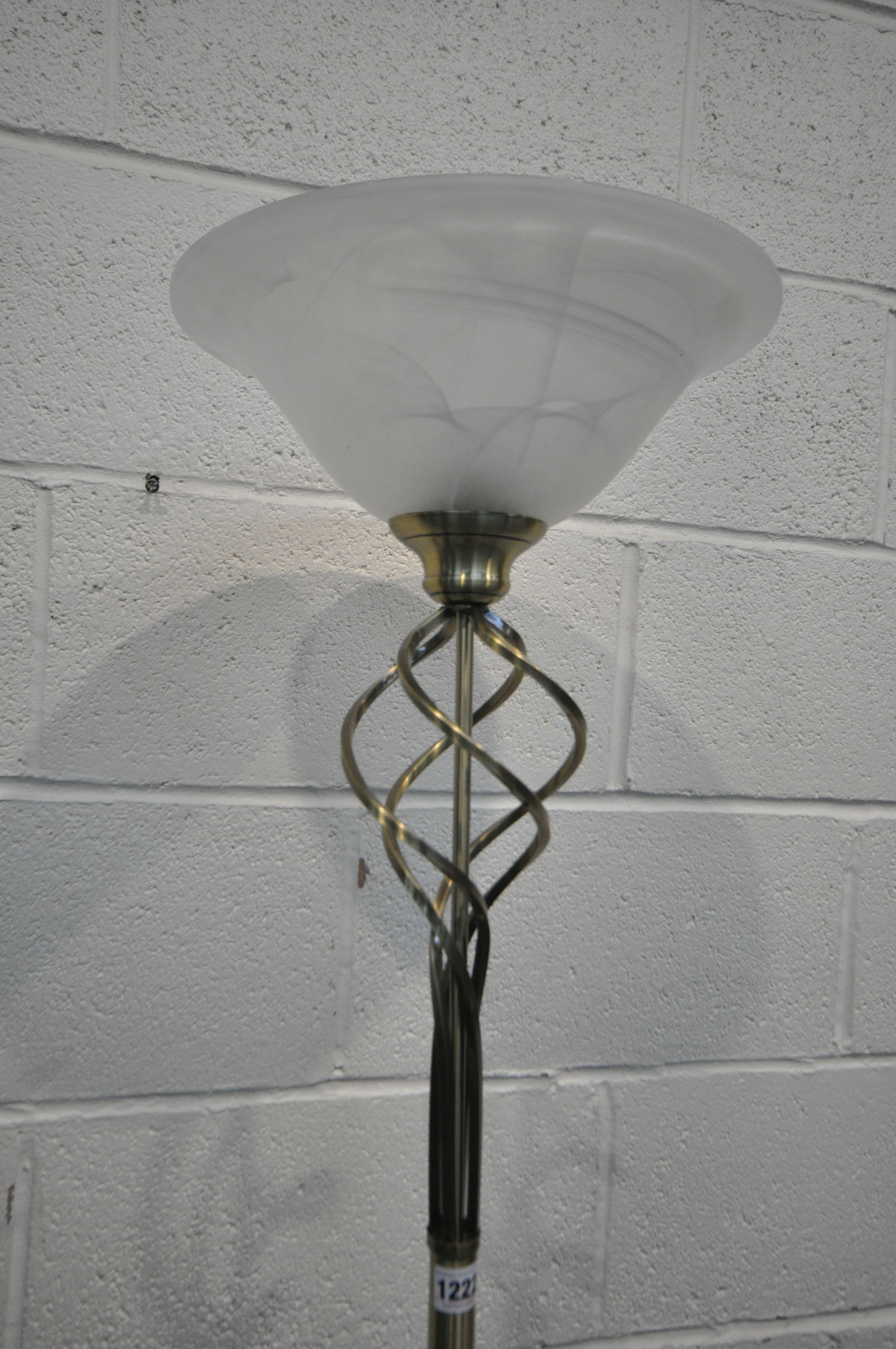 A MODERN FLOOR LAMP, with a frosted glass shade, three white painted chairs, and a traveling - Image 2 of 3