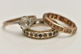 THREE RINGS, to include a yellow metal full eternity ring, set with colourless spinel, unmarked,