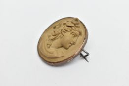 A LAVA CAMEO BROOCH, of an oval form, high relief cameo depicting a lady in profile, collet set in a