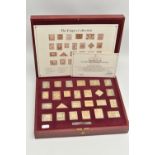 A CASED 'THE EMPIRE COLLECTION' GOLD PLATED SILVER STAMPS, set containing twenty-five stamps with