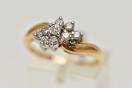 AN 18CT GOLD DIAMOND CLUSTER RING, marquise shape cluster set with nine round brilliant cut