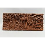 A SECOND HALF 20TH CENTURY BALINESE HIGH RELIEF CARVED RECTANGULAR TEAK PANEL, depicting figures and