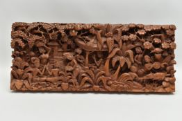 A SECOND HALF 20TH CENTURY BALINESE HIGH RELIEF CARVED RECTANGULAR TEAK PANEL, depicting figures and