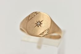 A 9CT GOLD SIGNET RING, round square form, set with a central single cut diamond, in a star setting,