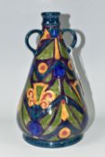 AN S. HANCOCK & SONS MORRIS WARE VASE, triangular form with twin handles, blue, green and yellow