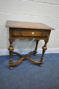 A REPRODUCTION GEORGIAN OAK SIDE TABLE, with a single frieze drawer, shaped apron, turned and