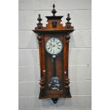 A 19TH CENTURY WALNUT VIENNA REGULATOR WALL CLOCK, with turned finials, the seven inch enamel dial