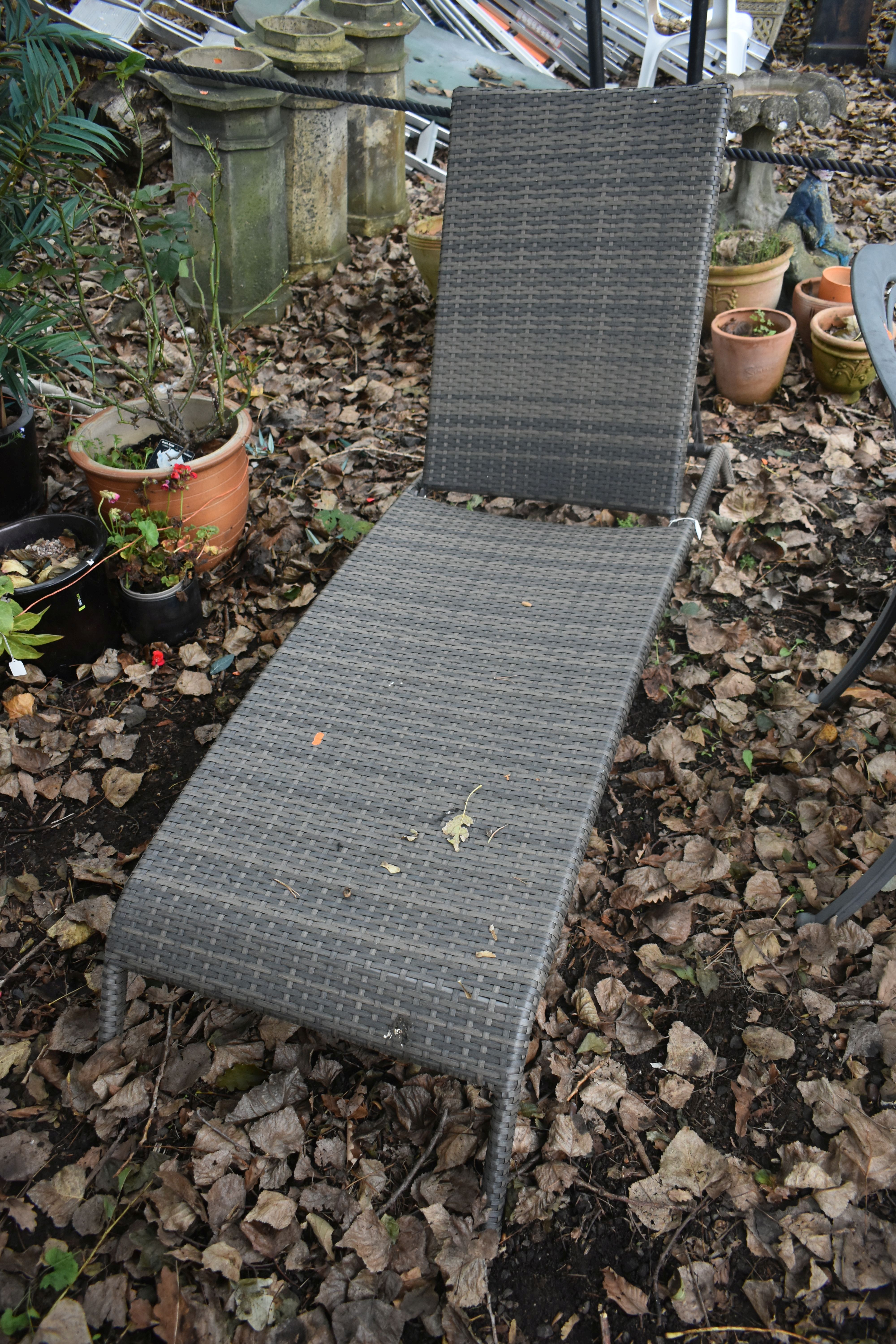 A HARTMAN FAUX RATTAN SUN LOUNGER, with an adjustable back and loose cushion (condition report: - Image 2 of 2