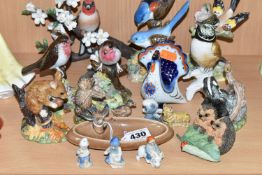 A COLLECTION OF BIRD FIGURINES, comprising a Royal Crown Derby 'Fairy Wrens' (a few nibbles to