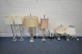 A VARIETY OF TABLE LAMPS, to include a pair of glass and chrome lamps, height 72cm, a coloured glass