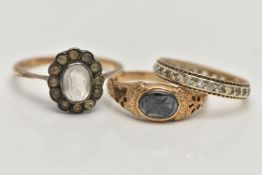 THREE GEM SET RINGS, to include an AF 9ct gold hematite intaglio signet ring, open work detailed