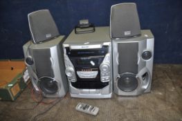 A SHARP CD-BA1700 MINI COMPONENT HI FI, with matching speakers, surround speakers and remote (PAT
