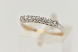 A YELLOW METAL DIAMOND NINE STONE RING, row of nine single cut diamonds, estimated total diamond