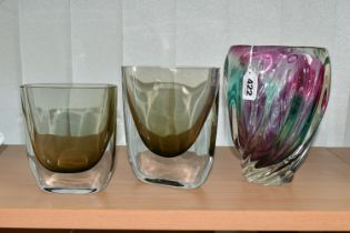 THREE PIECES OF 20th CENTURY STUDIO GLASS, comprising a vase of wrythen form, green and pink over