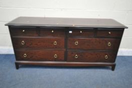 A STAG MINSTREL SIDEBOARD, with four short drawers over two pairs of long drawers, length 156cm x