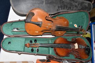 TWO CASED VIOLINS, in need of some attention, one bearing paper label reading 'Robert Weron,