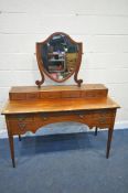AN EDWARDIAN WALNUT AND INLAID DRESSING TABLE, with a single shield swing mirror, with bevelled