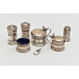 TWO 20TH CENTURY THREE PIECE SILVER CRUET SETS, comprising a George VI cylindrical set of salt and