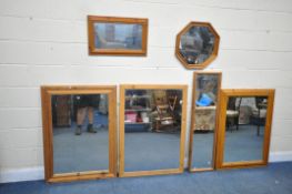 A SELECTION OF PINE FRAMED WALL MIRRORS, including one small octagonal mirror, largest 111cm x