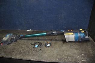 A SHARK DUO CLEAN CORDLESS VACUUM CLEANER with power supply (PAT pass and working) and a bag of