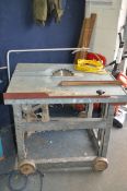 AN INDUSTRIAL SITE/TABLE SAW, with 90cm x 77cm, galvanised steel top surface, 10in blade, parallel