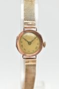 A 9CT GOLD WRISTWATCH, hand wound movement, round dial, Roman numerals, rose gold case,