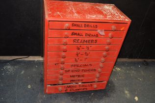 A PLYWOOD CHEST OF ELEVEN DRAWERS CONTAINING DRILL BITS, to include HSS, Taper shank, reamers, etc