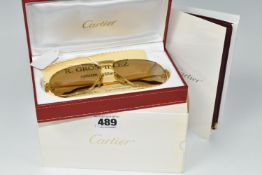 A BOXED AND CASED PAIR OF CARTIER TANK L. C. F. O. SUNGLASSES, 62 14, card box numbered T8200024,