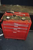 A MECHANICS METAL ROLLING WORKSHOP CABINET, with three drawers over a cupboard door, containing