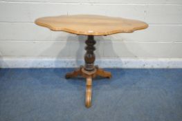 A 19TH CENTURY FRENCH CHERRYWOOD TILT TOP VIOLIN TABLE, with a shaped top, on a turned pedestal