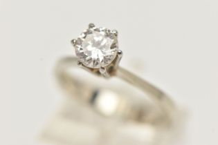 A WHITE METAL SINGLE STONE DIAMOND RING, round brilliant cut diamond in a six claw setting,