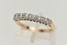 A 15CT GOLD HALF ETERNITY RING, set with a row of circular cut, cubic zirconia, to a polished
