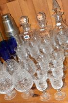 A GROUP OF CUT GLASSWARE, comprising a set of six cobalt blue wine glasses with clear twisted