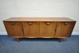 W H RUSSELL FOR GORDON RUSSELL, A MID-CENTURY MODEL 'BURFORD' R818 ROSEWOOD SIDEBOARD, with a