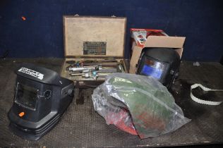 A BOX CONTAINING GAS AND OXY ACETYLENE TORCHES, an air fed mask (distressed)and three welding