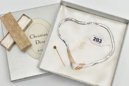 A 'CHRISTIAN DIOR' NECKLACE AND YELLOW METAL STICK PIN, a bi colour necklace with a cross over