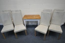 A PARTIALLY PAINTED TABLE, length 88cm x depth 58cm x height 73cm, along with a set of eight chairs,
