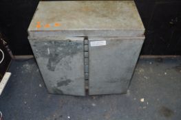 A GALVANISED STEEL ENGINEERS TOOL CABINET, with lift up lid concealing a lift out tray, above two