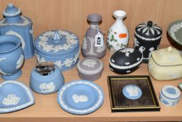 A COLLECTION OF WEDGWOOD JASPERWARE, comprising a pale lemon Prunus design trinket pot, two black