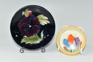 A MOORCROFT POTTERY 'PANSY' PATTERN PIN DISH, diameter 11.5cm impressed marks and paper Queen Mary
