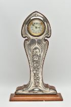 A GEORGE V ART NOUVEAU SILVER MOUNTED WALNUT MANTEL CLOCK, the repoussé front with sinuous scrolls