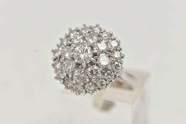 A WHITE METAL DIAMOND CLUSTER DRESS RING, circular cluster of round brilliant cut diamonds, centre