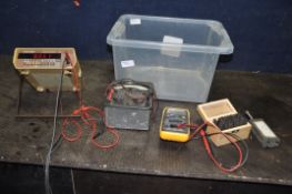 A TRAY CONTAINING ELECTRICAL TEST EQUIPMENT including a Racal-Dana 4002 (PAT pass and working), an