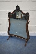 A GEORGIAN STYLE MAHOGANY DRESSING TABLE SWING MIRROR, with foliate crest, on ball and claw feet and