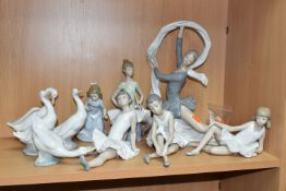 A LLADRO FIGURE AND NINE NAO FIGURES, comprising Lladro 'Laura' seated ballerina figure, model no